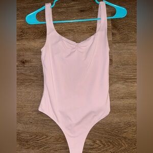 Aritizia: baby pink body contour body suit